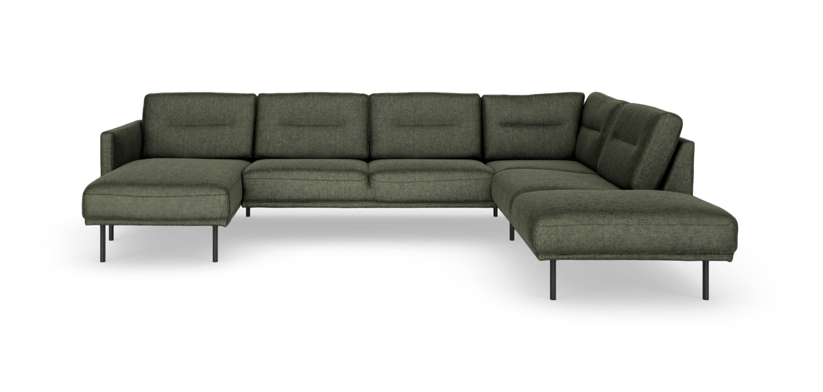 Grøn modulær U-formet hjørnesofa med chaiselong til venstre og slanke metalben.