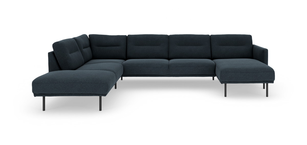 Mørkeblå modulær hjørnesofa med chaiselong til højre på slanke metalben.
