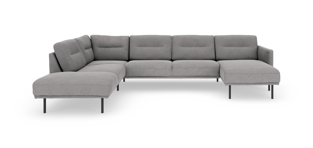 L‑formet modulsofa i lysegrå med chaiselong til højre og slanke metalben, frilagt på hvid baggrund.