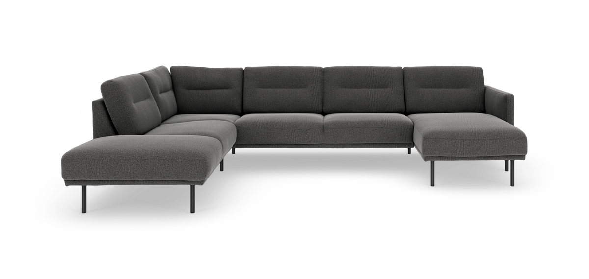 Mørkegrå modulsofa i L‑form med chaiselong, slanke metalben.