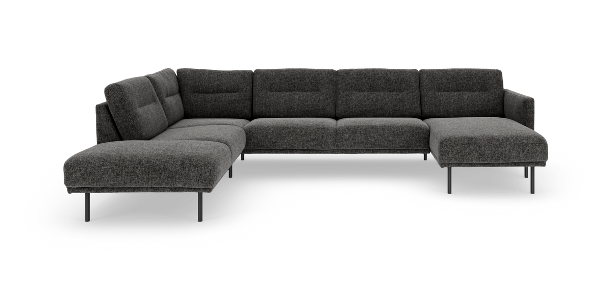 Mørkegrå modulsofa i L‑form med chaiselong på højre side, fritstående mod hvid baggrund.