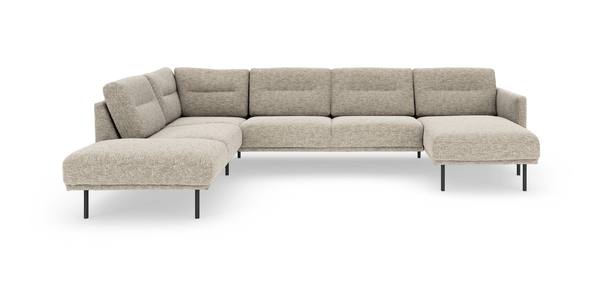 Beige modulsofa i L-form med metalben, frilagt på hvid baggrund.