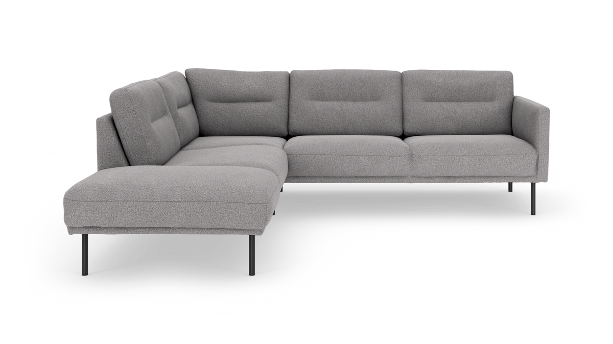 L-formet grå modulsofa i stof med slanke sorte metalben, produktfoto på hvid baggrund.
