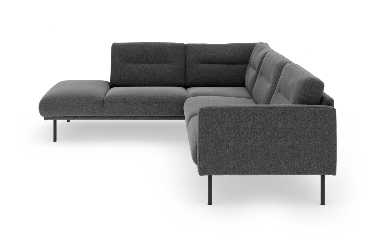 Mørkegrå modulopbygget hjørnesofa i L-form med slanke metalben, fritstående på hvid baggrund.