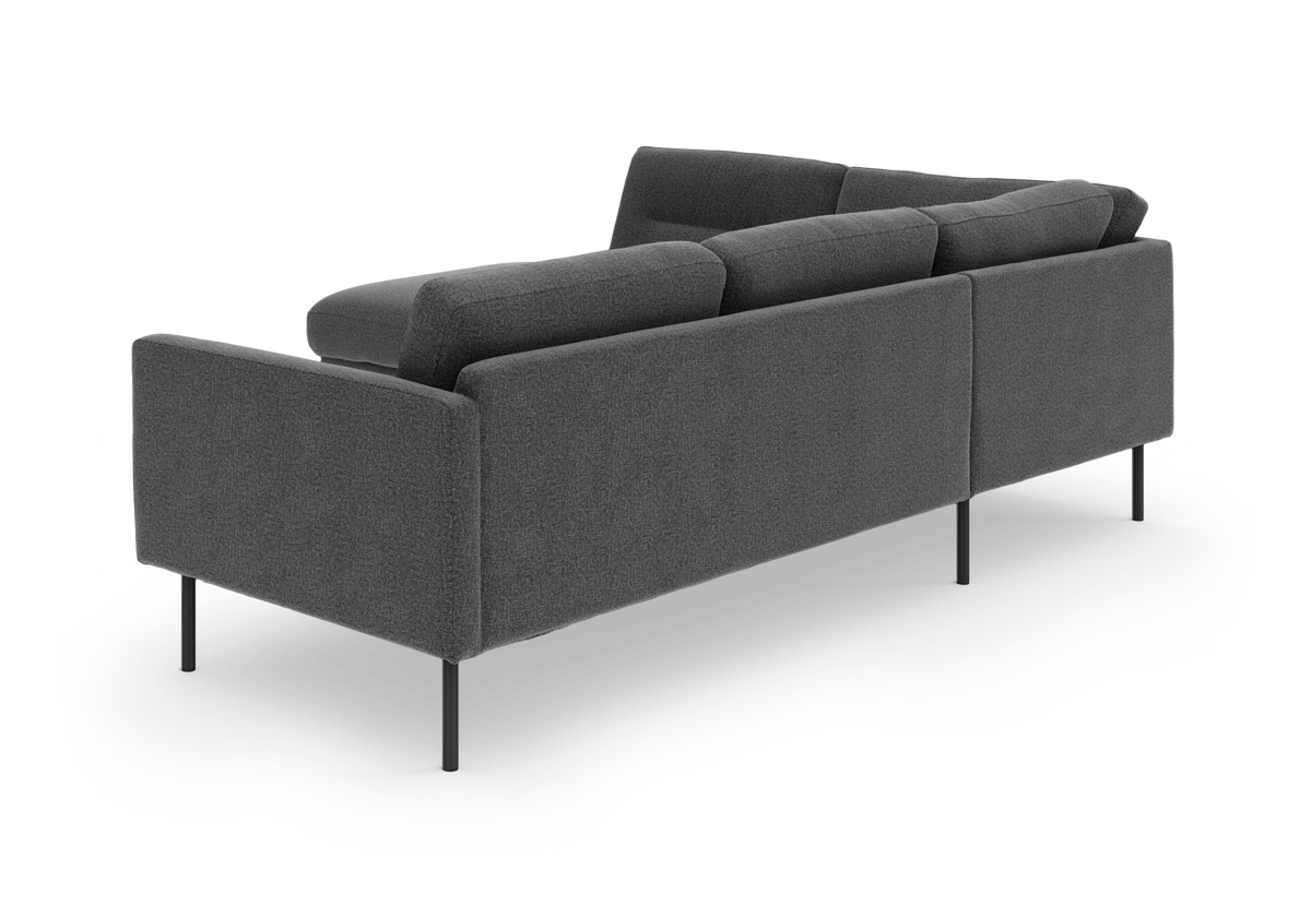 Mørkegrå moderne sofa set skråt bagfra, frilagt på hvid baggrund.