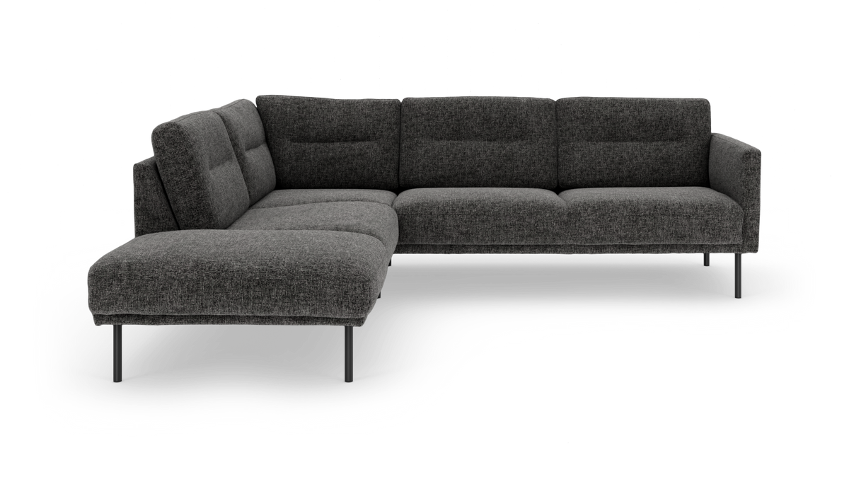Mørkegrå modulsofa i stof, L‑form med chaiselong til venstre og slanke metalben.