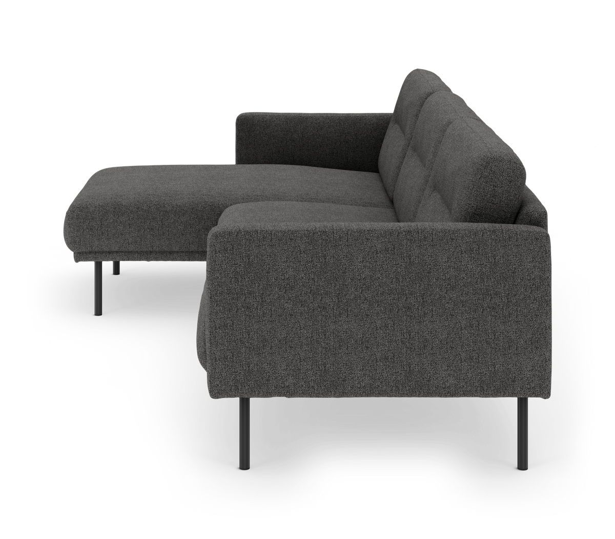 Mørkegrå L-formet modulsofa med chaiselong og slanke sorte ben, frilagt på hvid baggrund.