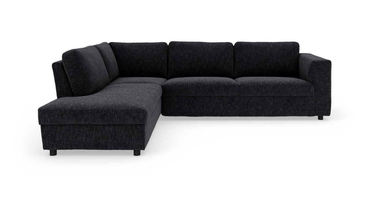 Mørkegrå L‑sofa med chaiselong til venstre, moderne og blød polstring.