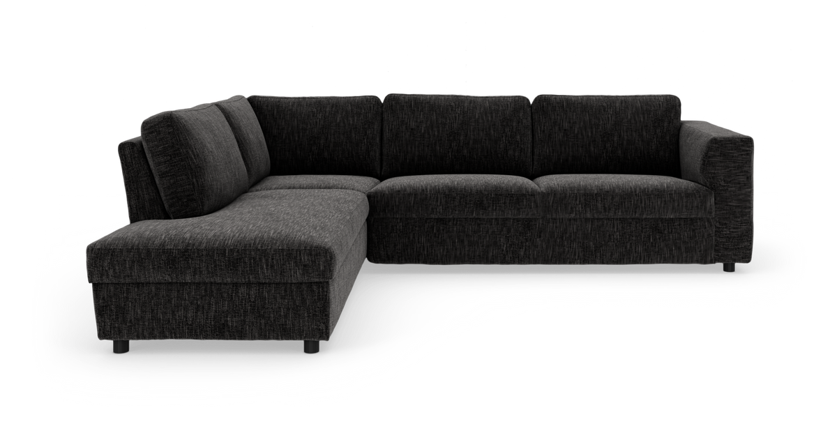 Mørkegrå L‑sofa med chaiselong til venstre, frilagt på hvid studiobaggrund.