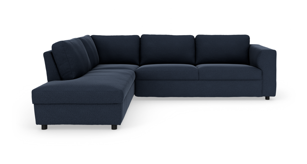 Mørkeblå L-formet modulsofa med venstrevendt chaiselong, frilagt på hvid baggrund.