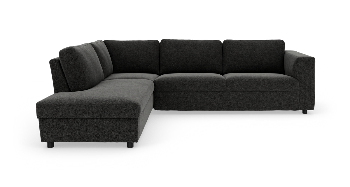 Mørkegrå L‑formet modulsofa med venstrevendt chaiselong, fritlagt på hvid baggrund.