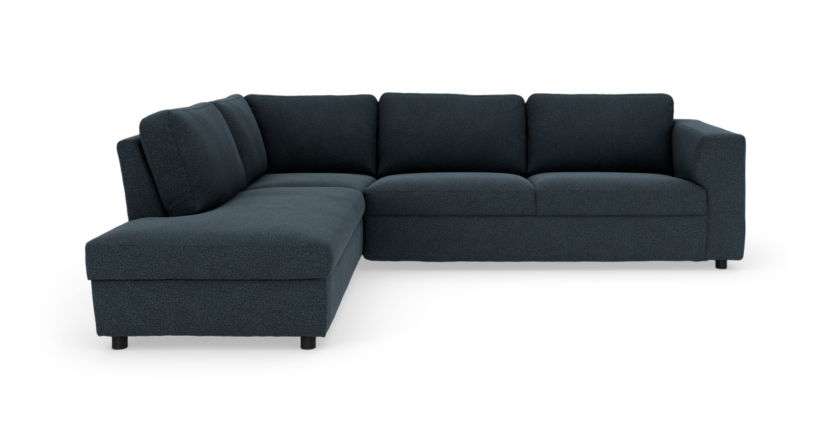 Mørkeblå L-formet modulsofa med venstrevendt chaiselong, frilagt på hvid baggrund.