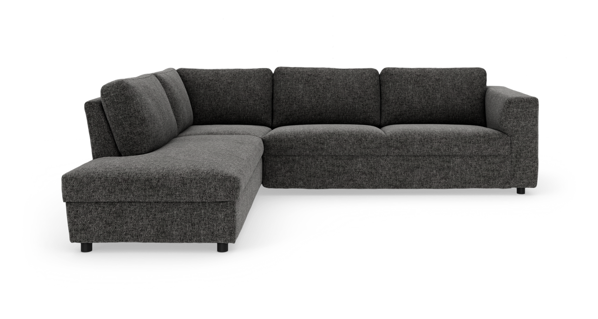 Mørkegrå hjørnesofa med venstrevendt chaiselong, moderne og blødt polstret på hvid baggrund.
