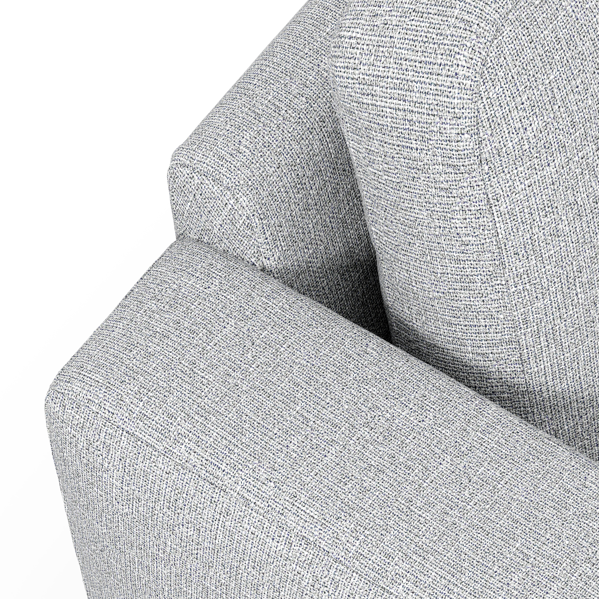 Nærbillede af lysegråt sofa-armlæn og rygpude i meleret tekstil.