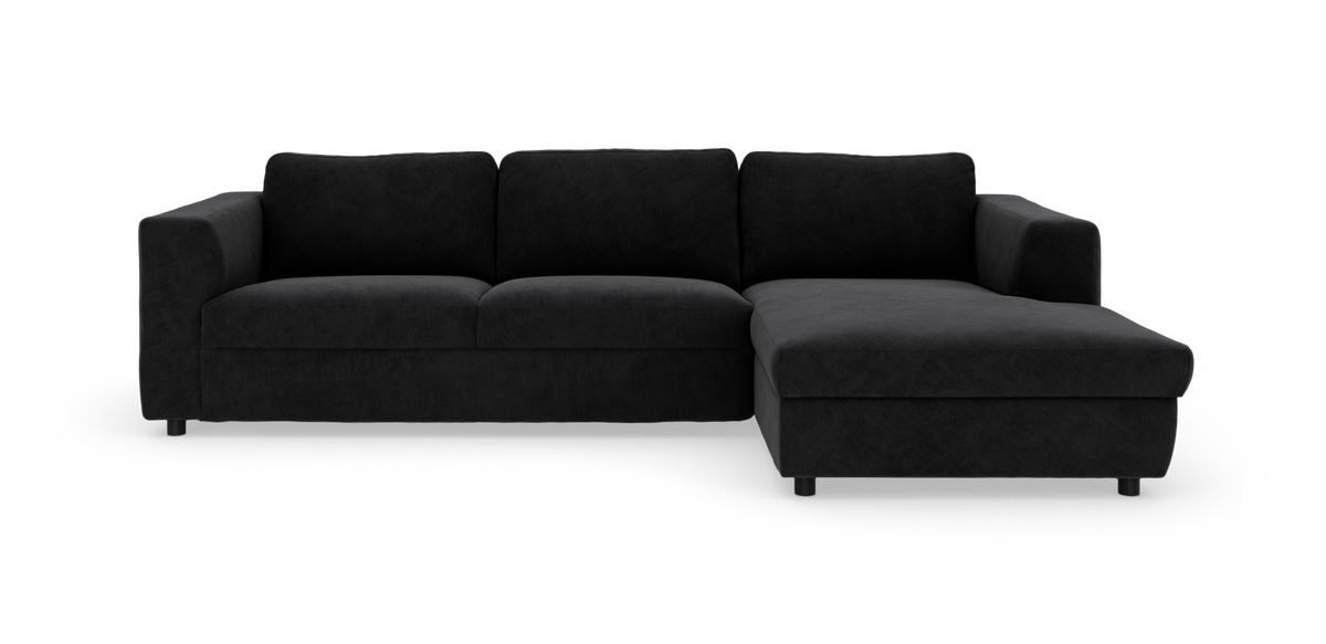 Sort hjørnesofa med chaiselong på højre side, fritlagt på hvid baggrund.