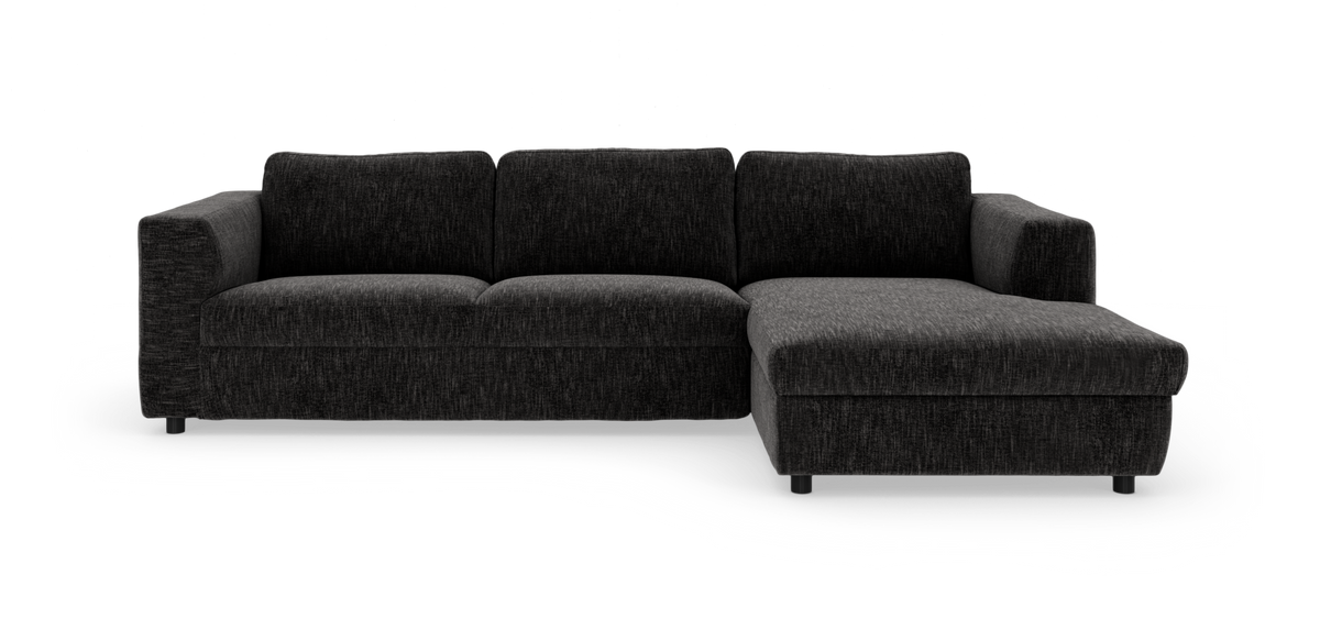 Mørkegrå hjørnesofa med chaiselong til højre, frilagt på hvid baggrund.