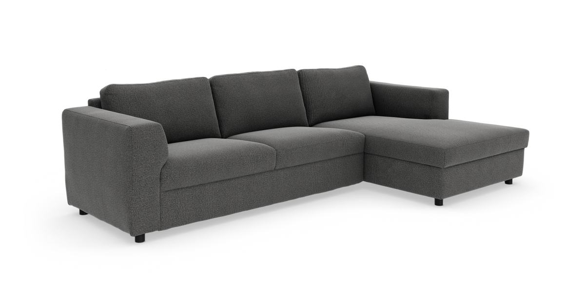Mørkegrå hjørnesofa med højrevendt chaiselong, tre sæder, frilagt på hvid baggrund.