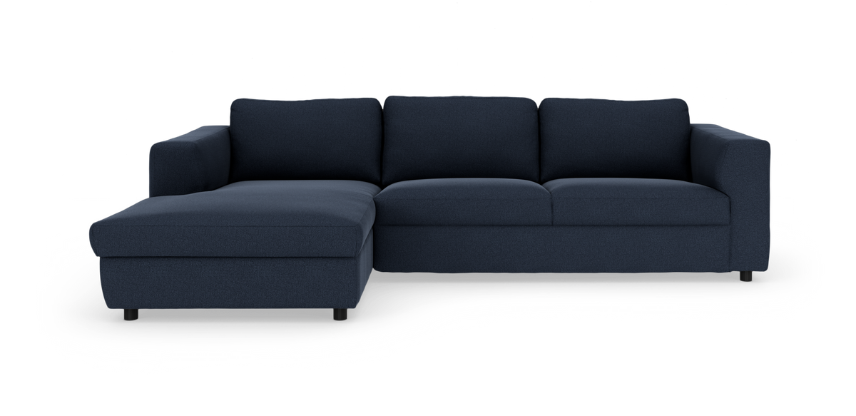 Mørkeblå hjørnesofa med venstrevendt chaiselong i moderne design på hvid baggrund.