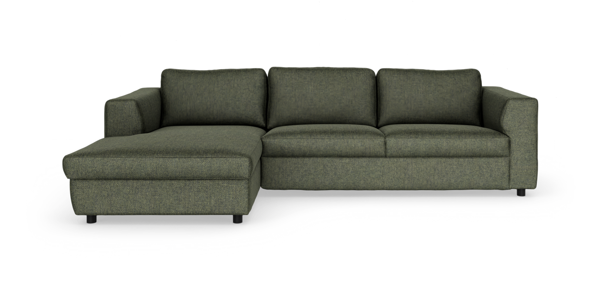 Grøn modulsofa med chaiselong til venstre, tre sæder og slanke sorte ben.