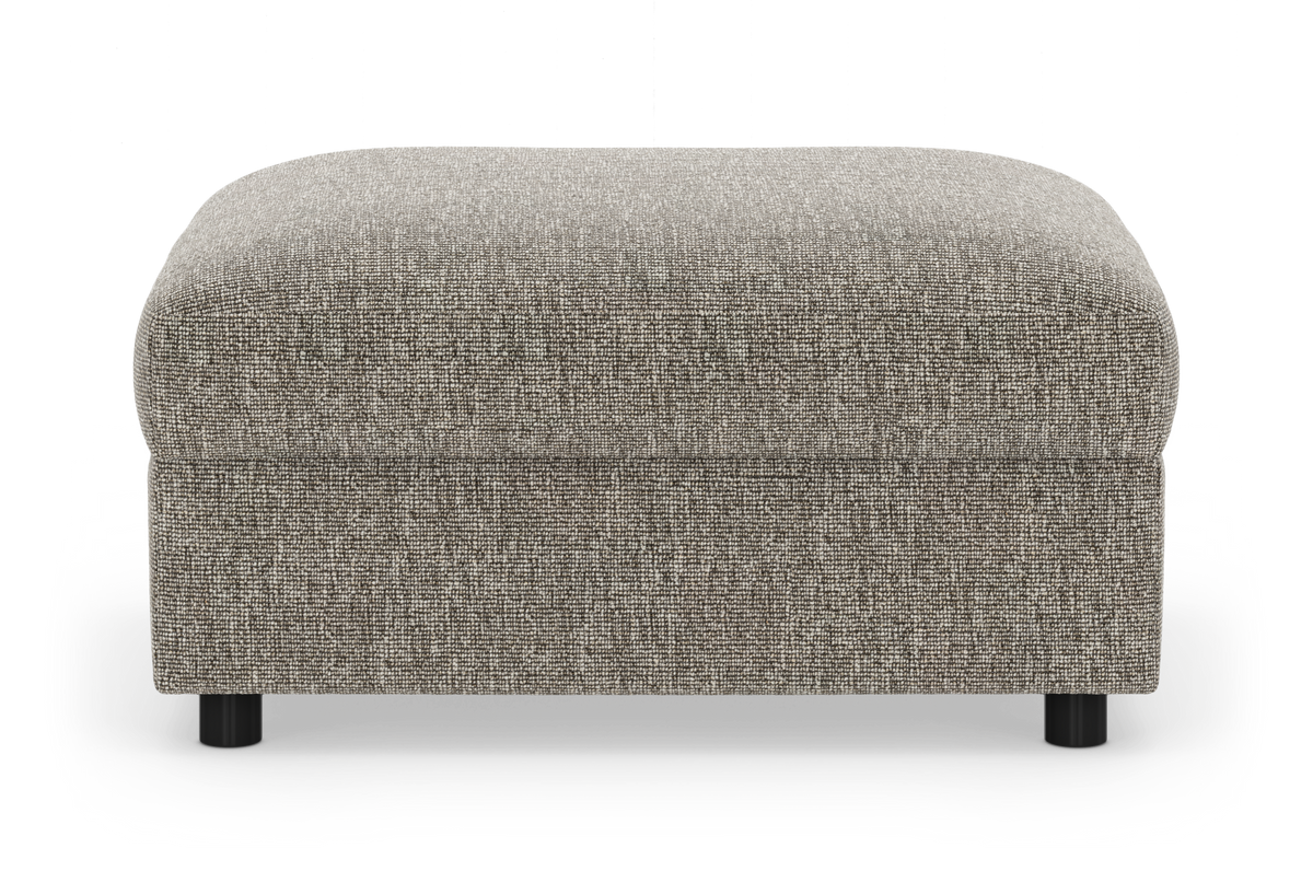 Grå‑beige stofpuf/ottoman i moderne stil, frontvisning på hvid baggrund.
