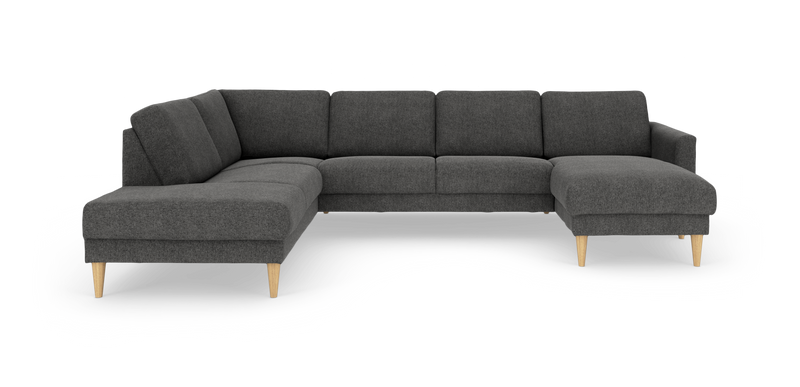 Mørkegrå hjørnesofa i stof med chaiselong og lyse træben, frilagt på hvid baggrund._ps
