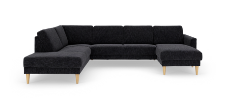 Mørkegrå modulhjørnesofa med chaiselong til højre og lyse træben, frilagt på hvid baggrund.