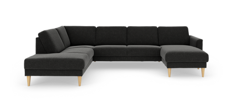 Mørkegrå hjørnesofa i stof med chaiselong til højre og lyse træben.