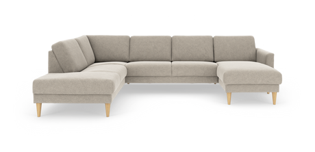 L‑formet hjørnesofa i beige stof med træben, frilagt på hvid baggrund.