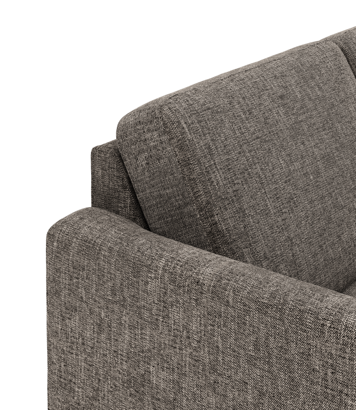 Nærbillede af grå stofsofas armlæn og ryghynde i studiemiljø.