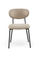 Beige polstret spisebordsstol med rund ryglæn og sorte metalben, set forfra mod hvid baggrund.