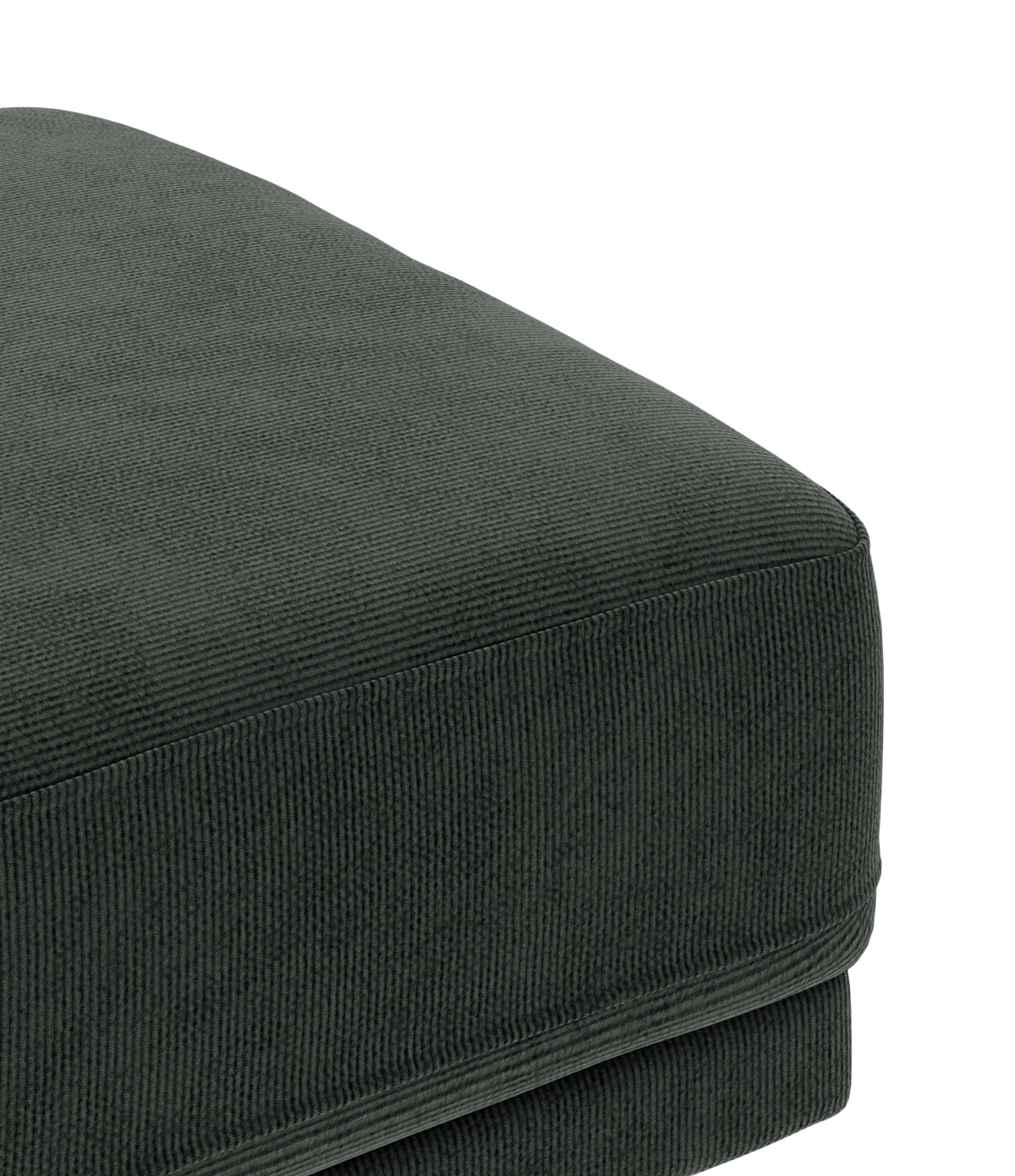 Nærbillede af mørkegrøn kordfløjl-betrukket sofahynde/ottoman i studie.