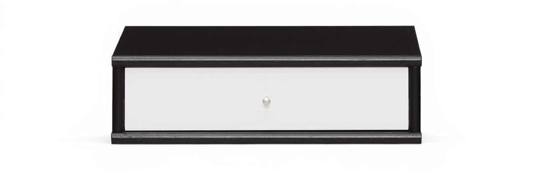 Sort skuffemodul med hvid front og rund knop, frilagt i frontvisning.