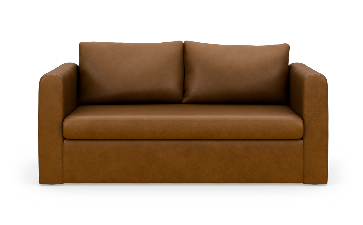 Brun lædersofa med to ryghynder, frilagt på hvid baggrund.