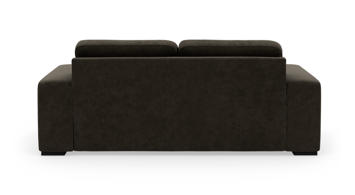 Mørkebrun stofsofa set bagfra, fritlagt mod hvid baggrund.