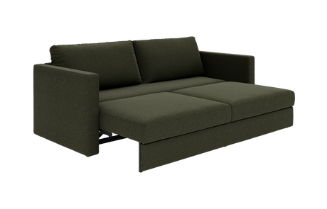 Mørkegrøn sovesofa med to ryghynder, trukket ud til sengeleje, på hvid baggrund.