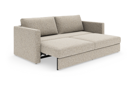 Beige sovesofa i stof med udtræksseng, frilagt i studie.