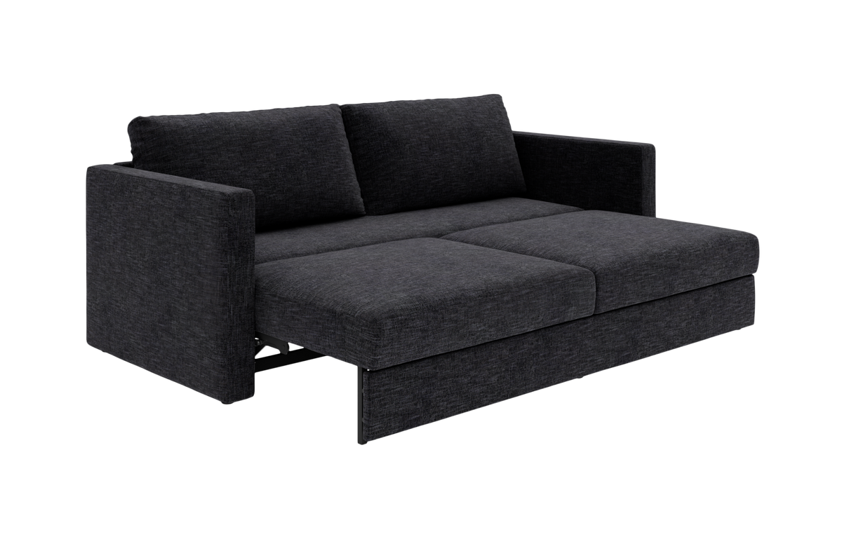Mørkegrå stof-sovesofa trukket ud til seng med lige armlæn og to ryghynder.