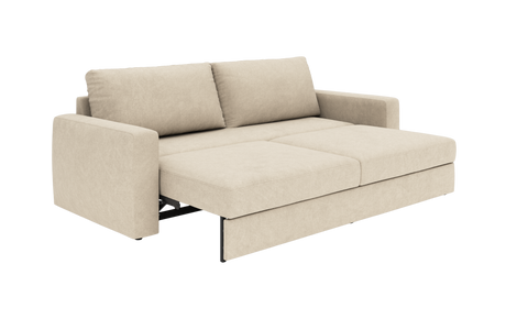 Beige sovesofa i stof, slået ud til seng med to ryghynder.