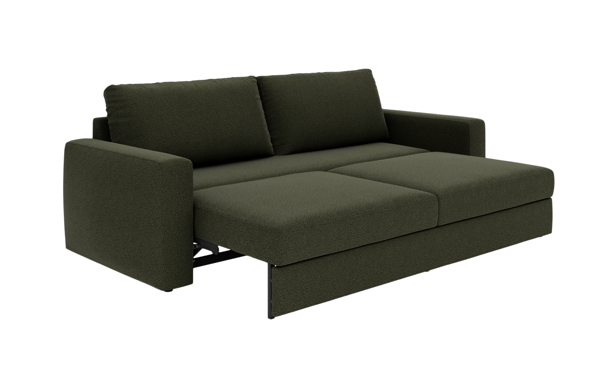 Mørkegrøn sovesofa i moderne design, trukket ud til sengestilling med to ryghynder.