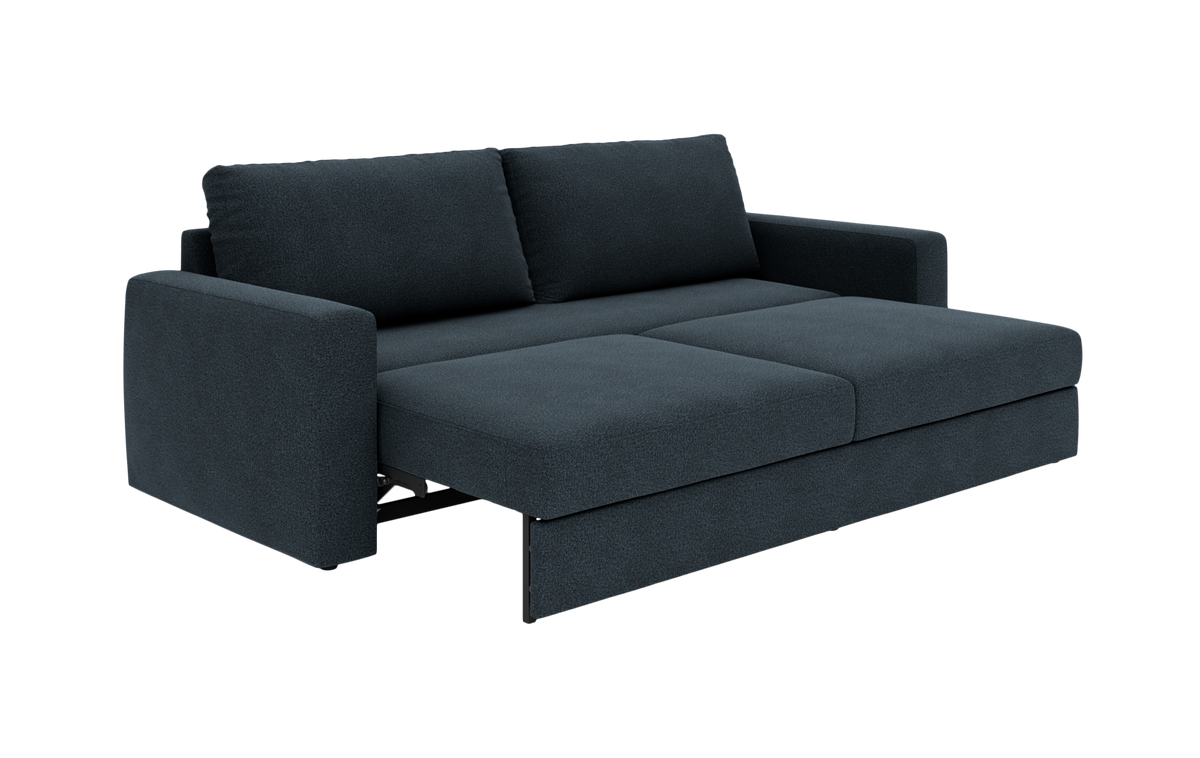 Mørkeblå sovesofa i stof, slået ud til seng med lige armlæn og to ryghynder.