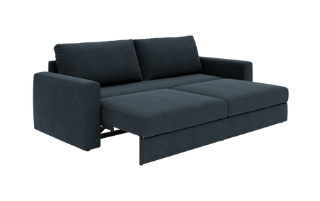 Mørkeblå sovesofa i stof, slået ud til seng med lige armlæn og to ryghynder.