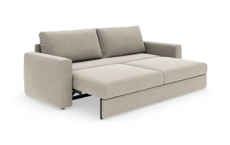 Beige sovesofa med udtrukket liggedel, to rygpuder og lige armlæn i moderne, minimalistisk design.