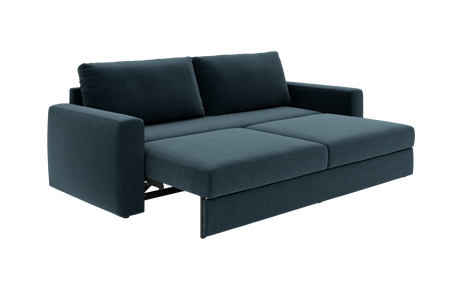 Mørk petrolblå sovesofa trukket ud til seng med lige armlæn og to ryghynder.