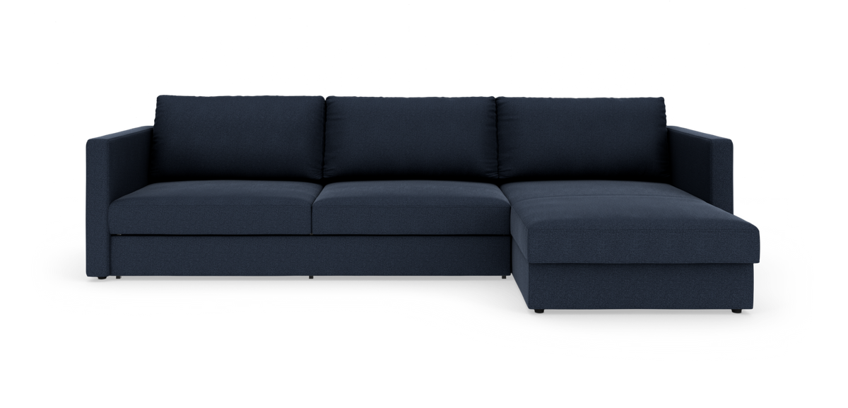 Mørkeblå hjørnesofa med chaiselong til højre, enkel og moderne, fotograferet i studie.