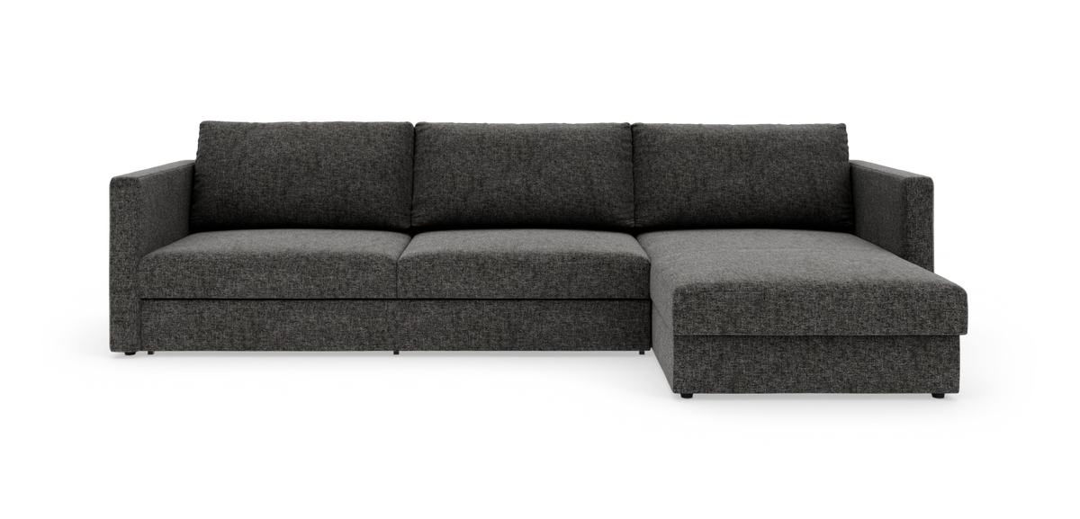 Mørkegrå hjørnesofa med chaiselong til højre på hvid baggrund.