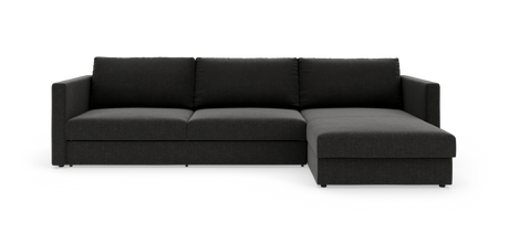 Mørkegrå hjørnesofa med chaiselong til højre, frilagt på hvid baggrund.