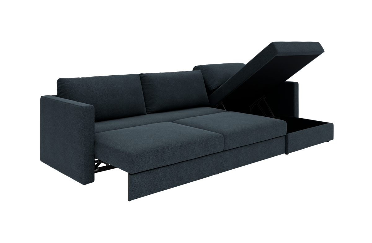 Mørkeblå sovesofa med åbnbar chaiselong og integreret opbevaring, frilagt på hvid baggrund.