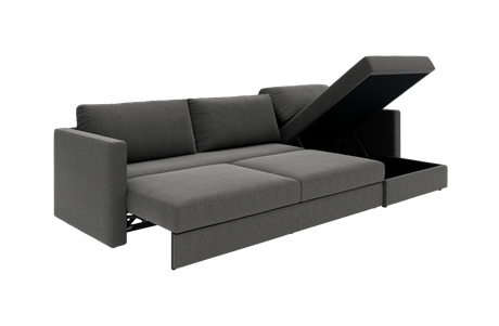 Mørkegrå 3-personers sofa med chaiselong og åben opbevaring i sædet, frilagt produktfoto i vinkel.