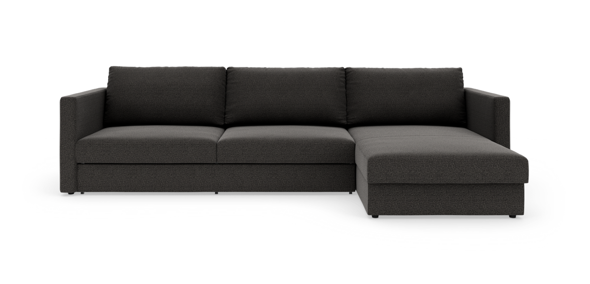 Mørkegrå hjørnesofa med chaiselong til højre, frilagt på hvid baggrund.