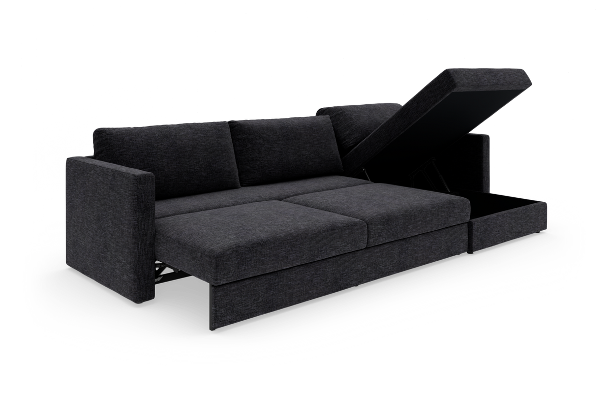 Mørkegrå sovesofa med åbent opbevaringsrum i chaiselongen, frilagt på hvid baggrund.